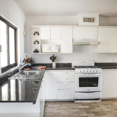Отель Beachfront Villa в номере