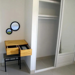 Отель JJ Residence сейф в номере