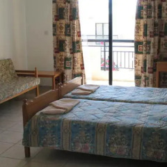 Апартаменты Pagona Holiday Apartments комната для гостей фото 3