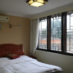 Отель Zhou Zhuang Zhen Feng Inn комната для гостей фото 2