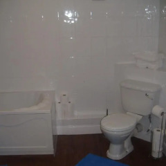 Апартаменты The Village Inn Apartment ванная