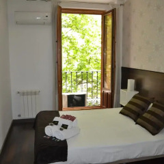 Отель Hostal El Brezo Стандартный номер с различными типами кроватей фото 10