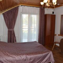 Гостиница Postoyaly Dvor Mini-hotel в Туле отзывы, цены и фото номеров - забронировать гостиницу Postoyaly Dvor Mini-hotel онлайн Тула комната для гостей