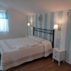 Отель B&B Le Rose Монтефано сейф в номере