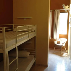 Отель Hostal Paraiso Кровать в общем номере
