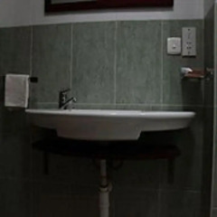 Апартаменты Calabash Green Executive Apartments Тема ванная