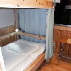 Отель Guesthouse Yakushima 2* Кровать в женском общем номере фото 3