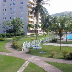 Отель Beach-side condos at Turtle Beach Towers фото 2