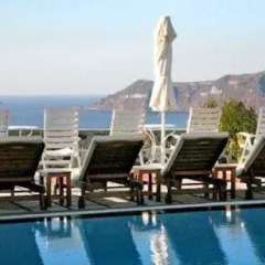 Nikos Villas Hotel in Oia Santorini 3* Студия с различными типами кроватей фото 3