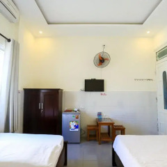 Отель Nhu Huy Homestay Стандартный семейный номер с двуспальной кроватью фото 4