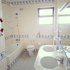 Отель Squash Apartamentos Портимао ванная
