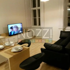 Апартаменты Nozzi 4 Apartment комната для гостей