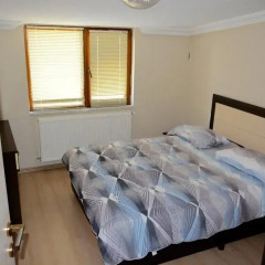 Апартаменты Yaman Apartment Cappadocia Аванос комната для гостей фото 2