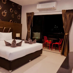 Отель 101 Holiday Suites 4* Номер Делюкс фото 2