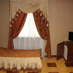 Мини-Отель Альпари Стандартный номер с 2 отдельными кроватями фото 7