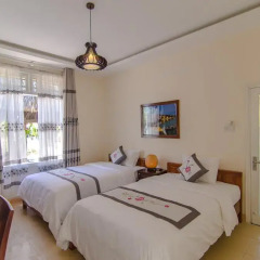 Отель The Moon River Homestay & Villa 3* Улучшенный номер с 2 отдельными кроватями