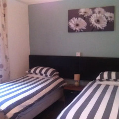 Отель Russell Guest House Стандартный номер с 2 отдельными кроватями фото 4