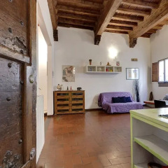 Отель Appartamenti Ponte Vecchio в номере