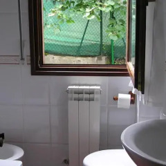 Отель Apartamentos Los Anades Испания, Арнуэро - отзывы, цены и фото номеров - забронировать отель Apartamentos Los Anades онлайн ванная