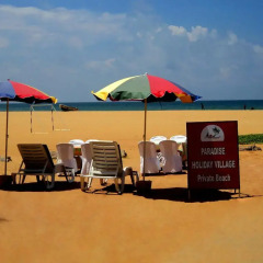 Отель Paradise Holiday Village пляж фото 2