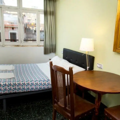 Отель Hostal LK Стандартный номер с 2 отдельными кроватями (общая ванная комната) фото 2