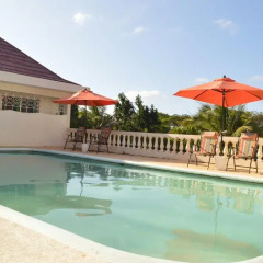 Отель Sea Grove Villa бассейн