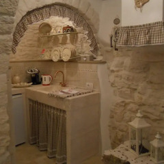 Отель Trullo del Vescovo Альберобелло в номере фото 2