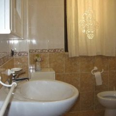 Отель ScaleaMare Holiday Home Скалея ванная