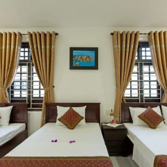 Отель Homestay Golden Bee 2* Семейный номер Делюкс с двуспальной кроватью фото 2