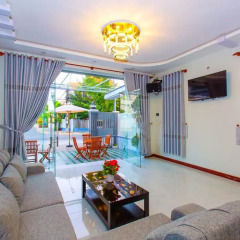 Отель MiMi Ho Guesthouse Номер Делюкс с различными типами кроватей фото 2