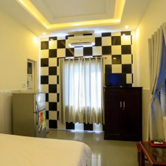Отель Nhu Huy Homestay Номер Делюкс с различными типами кроватей фото 4