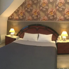 Гостиница Berloga-City Mini-Hotel в Великом Новгороде отзывы, цены и фото номеров - забронировать гостиницу Berloga-City Mini-Hotel онлайн Великий Новгород комната для гостей фото 3