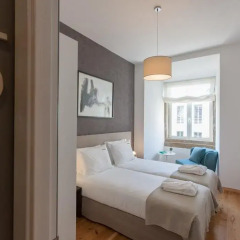 Отель Feels Like Home Rossio Prime Suites 4* Стандартный номер с 2 отдельными кроватями (общая ванная комната) фото 6