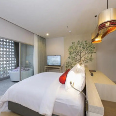 Отель Ramada by Wyndham Phuket Deevana Patong Номер Делюкс с двуспальной кроватью фото 4