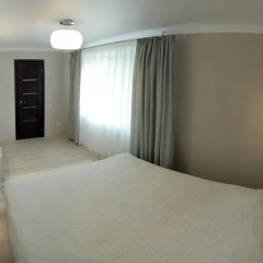 Апартаменты Lotos for You Apartments комната для гостей
