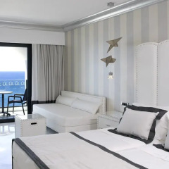 Отель Mitsis Alila Exclusive Resort and Spa 5* Улучшенный номер с 2 отдельными кроватями фото 4