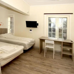Airport Motel & Apartment Hostel комната для гостей