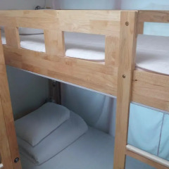 Отель Happytree Guesthouse Кровать в женском общем номере с двухъярусной кроватью