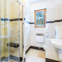 Отель Apartamenty Comfort z kominkiem, balkonem i ogrodem ванная