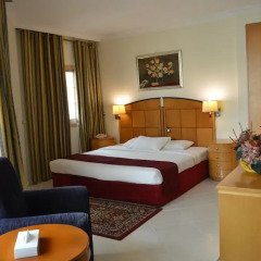 Отель Dolphin Hotel Apartments ОАЭ, Дубай - отзывы, цены и фото номеров - забронировать отель Dolphin Hotel Apartments онлайн комната для гостей