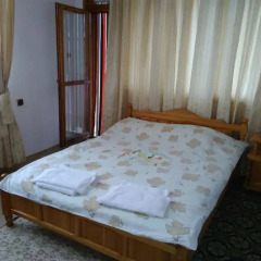 Отель Shishkovi Guesthouse Чепеларе комната для гостей фото 2