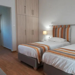 Отель Olive Grove Resort сейф в номере