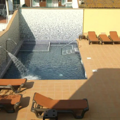 Отель Apartamentos Neptuno бассейн