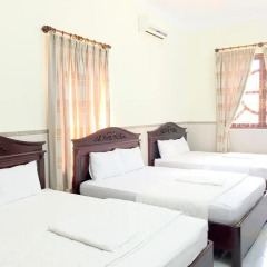 Отель Mr Tran (Blue Motel) 2* Стандартный семейный номер с двуспальной кроватью фото 3
