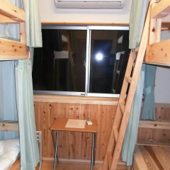 Отель Guesthouse Yakushima 2* Кровать в женском общем номере фото 5