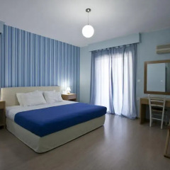 Отель Valente Perlia Rooms Греция, Порос - отзывы, цены и фото номеров - забронировать отель Valente Perlia Rooms онлайн комната для гостей