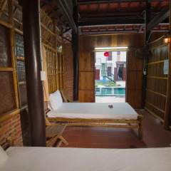 Отель Tra Que Flower Homestay Кровать в общем номере с двухъярусной кроватью фото 2