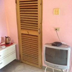 Отель Villa La Cage удобства в номере