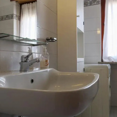 Отель Alloggio Vacanze La Terrazza Робассомеро ванная