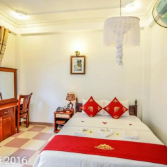 Отель Nhi Nhi 3* Номер Делюкс фото 5